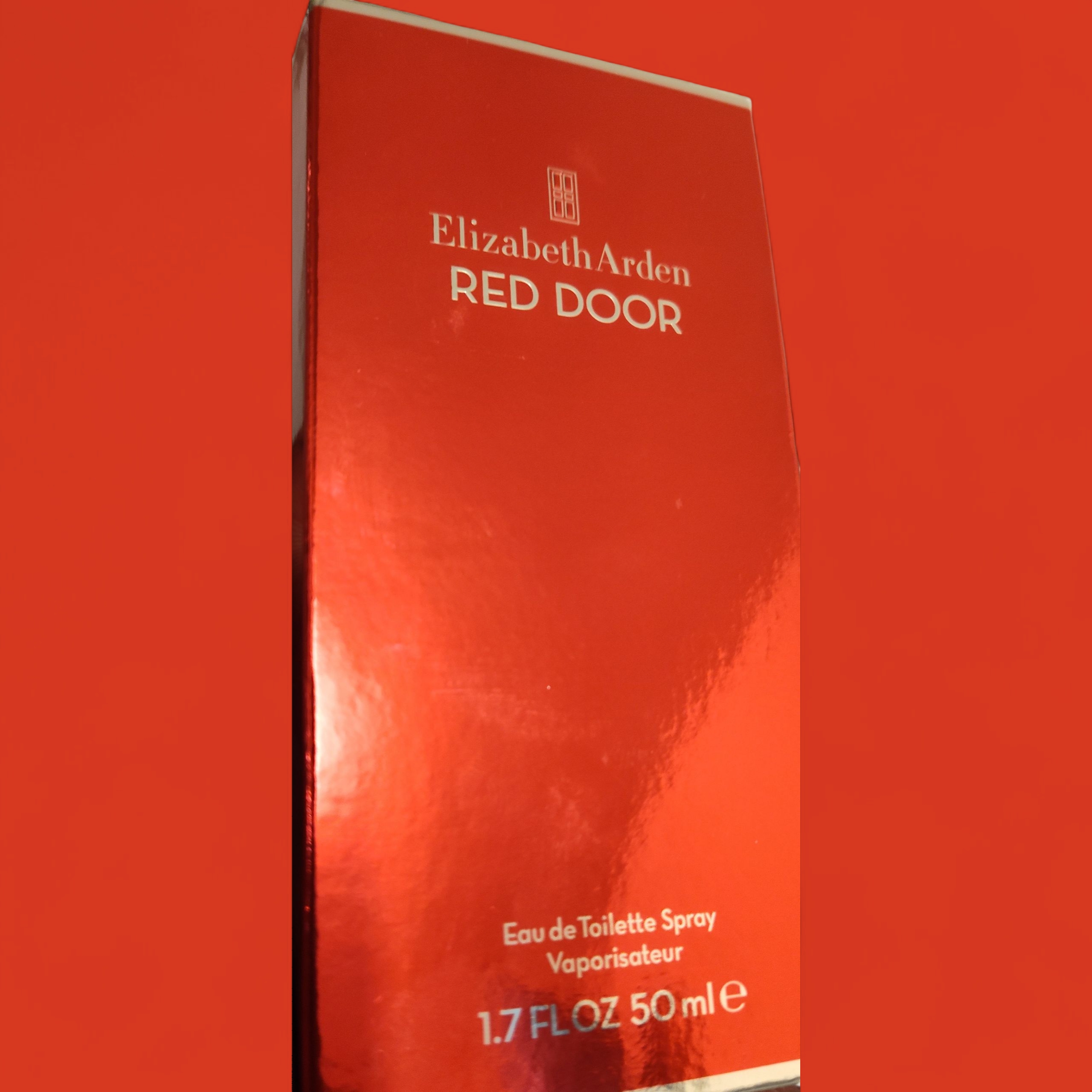 Elizabeth Arden Red Door Perfume In Vibrant Red